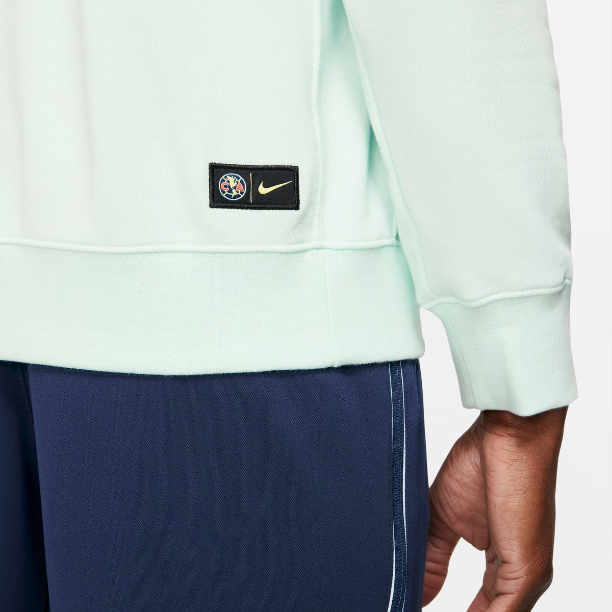 Nike Club America Men French Terry Soccer Hoodie product image 5, provided for visual reference and product detail review