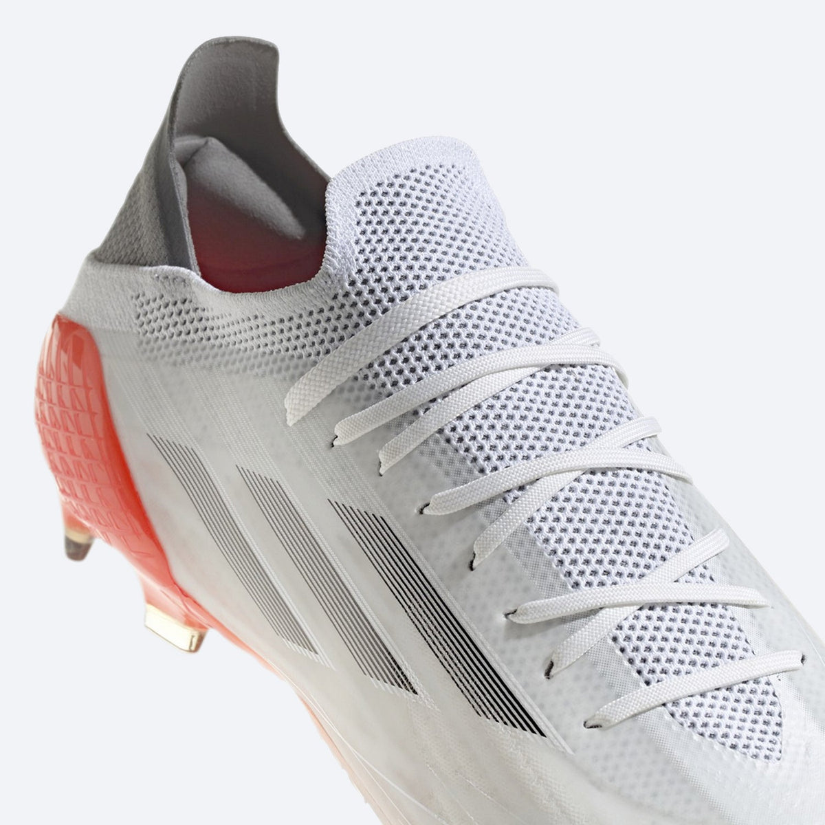 X Speedflow.1 Fg Firm Ground Soccer Shoes White/Red product image 2, provided for visual reference and product detail review